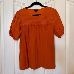 JCrew cotton top in a beautiful warm orange color with special details